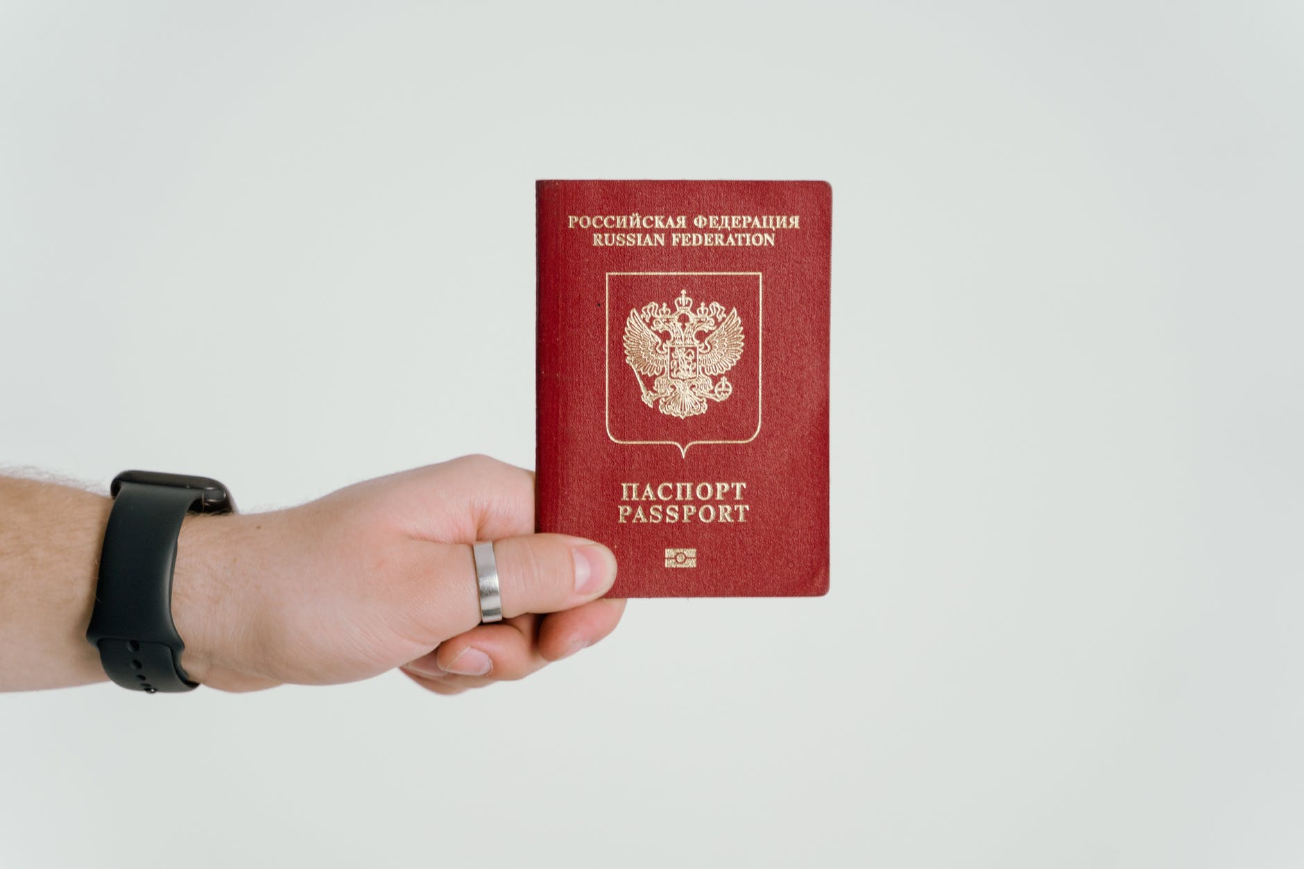 person holding a russian passport