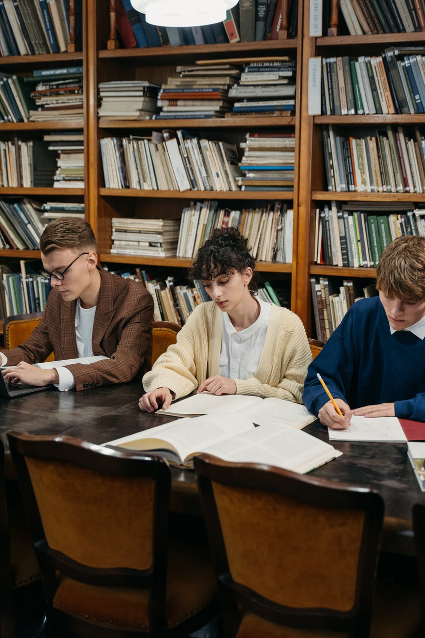 students studying together in a library