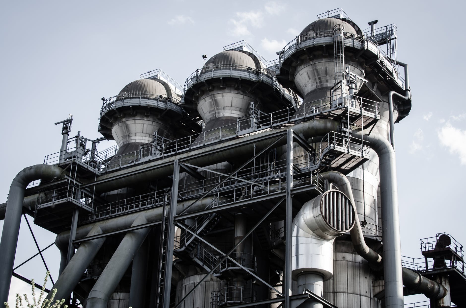 grayscale photo of metal building