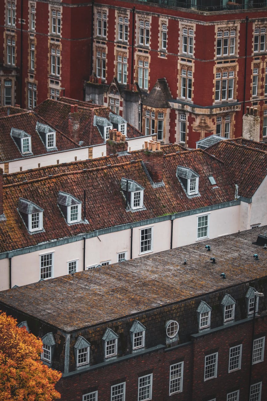 concrete buildings with white framed windows