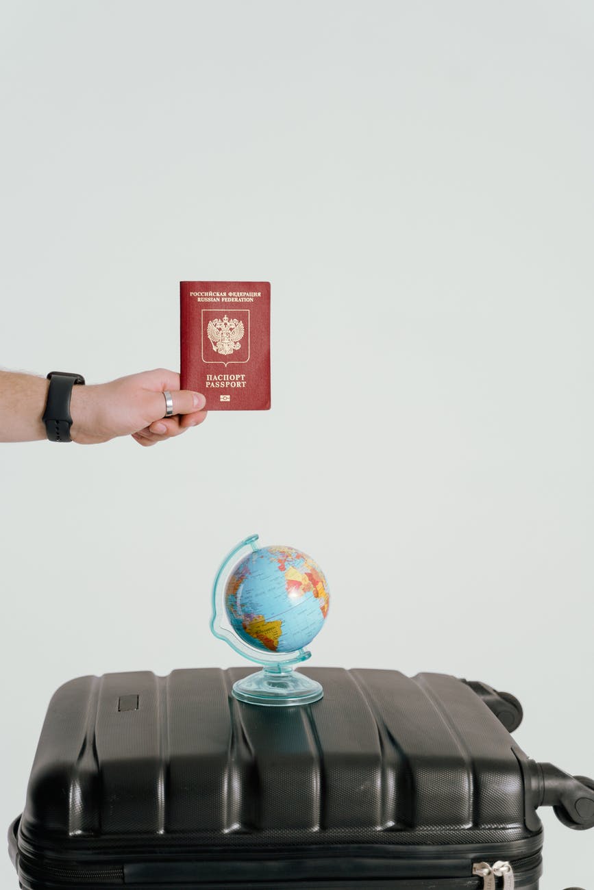 person holding a passport
