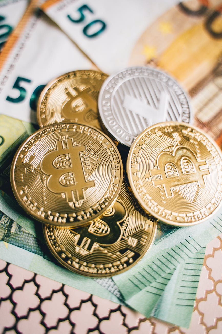 close up shot of coins and bills