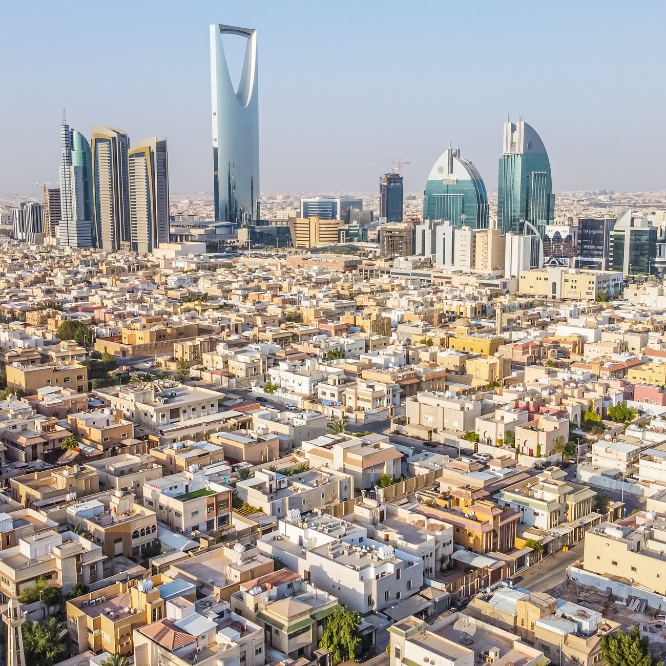 the kingdom center amidst city buildings in riyadh saudi in aerial photography