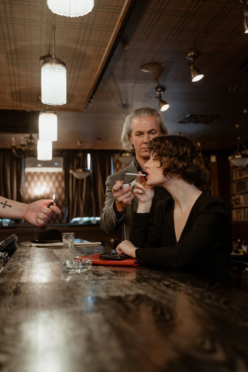 man and woman sitting at the table