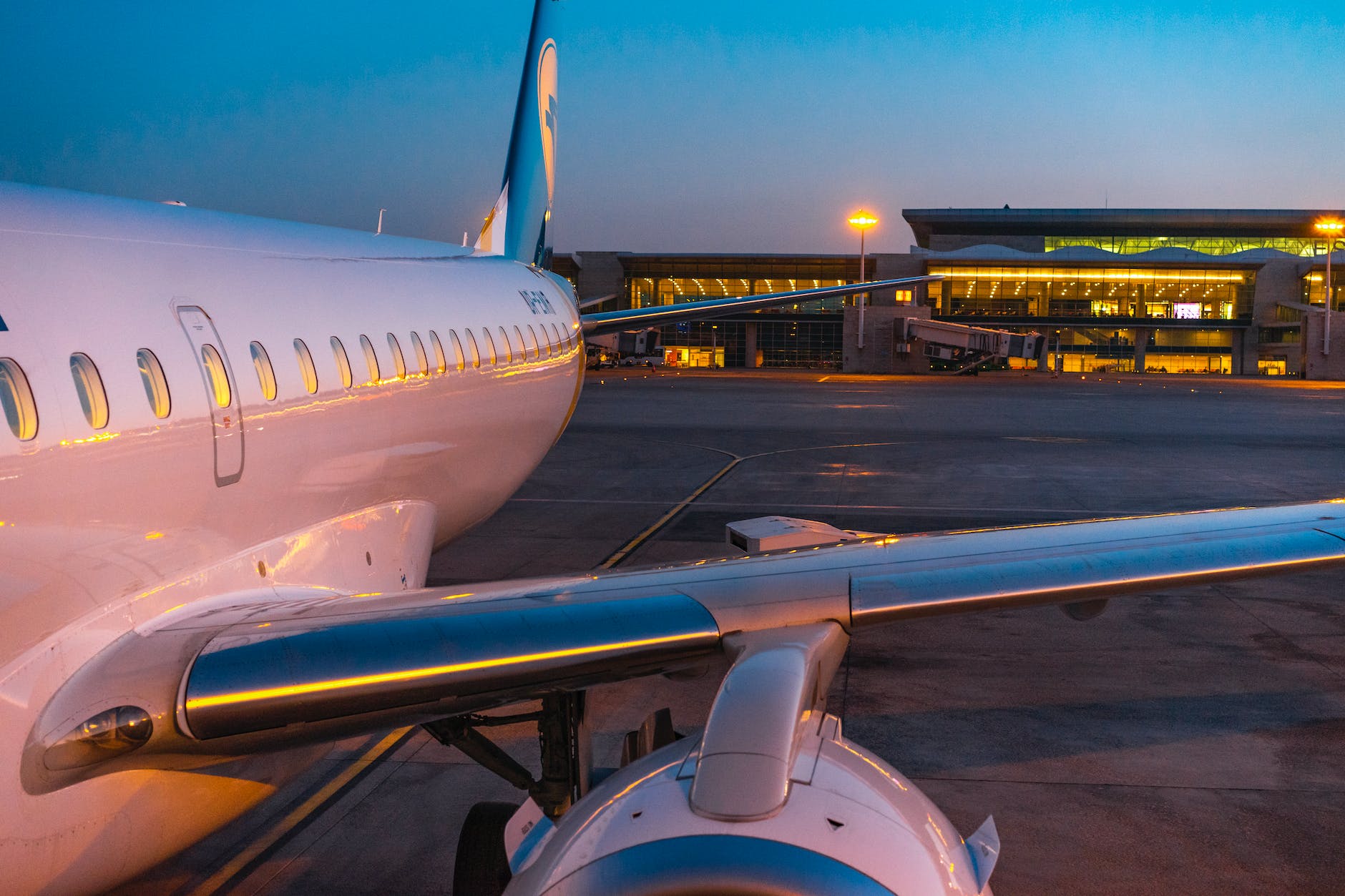 closeup of an airplane on an airport at dusk