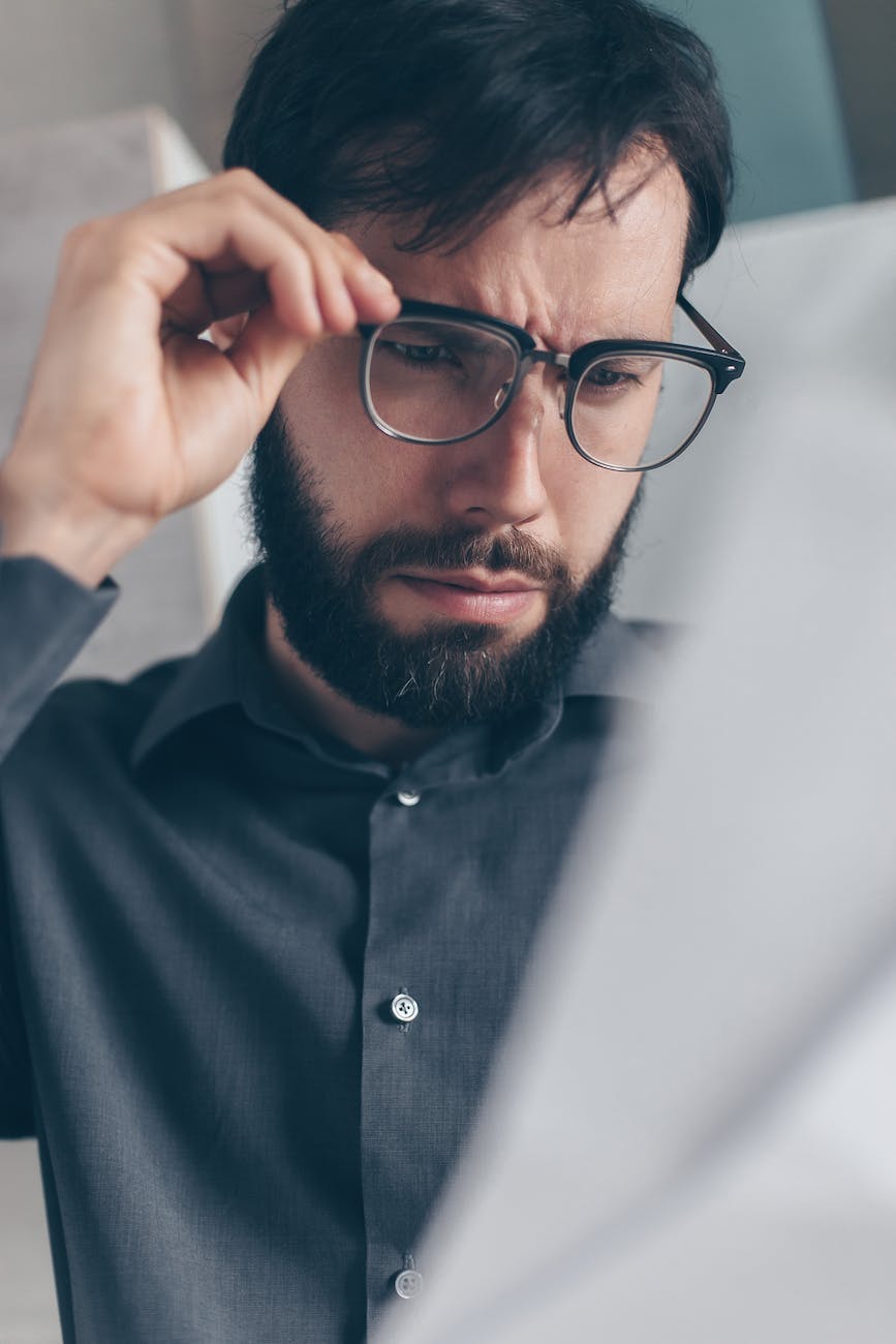 a man looking at the documents