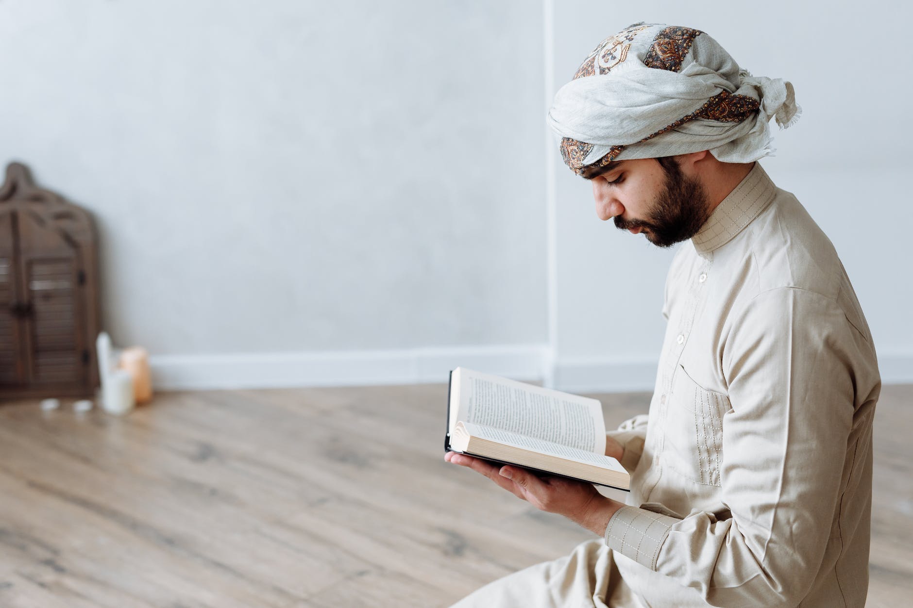 a man reading quran