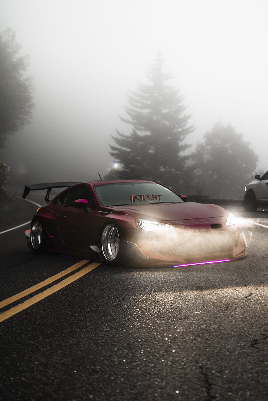 luxury car in a gray asphalt