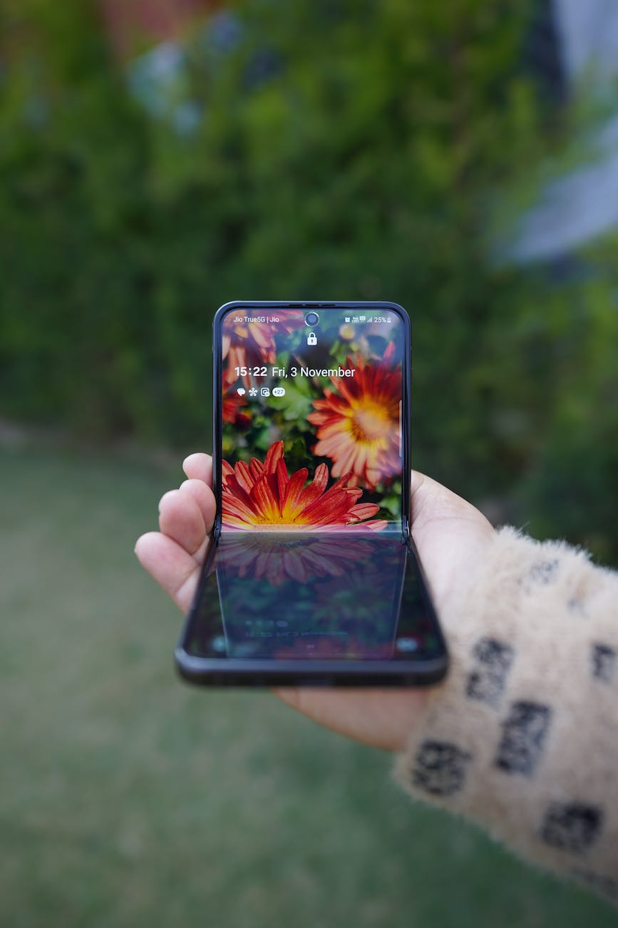 hand with foldable smartphone