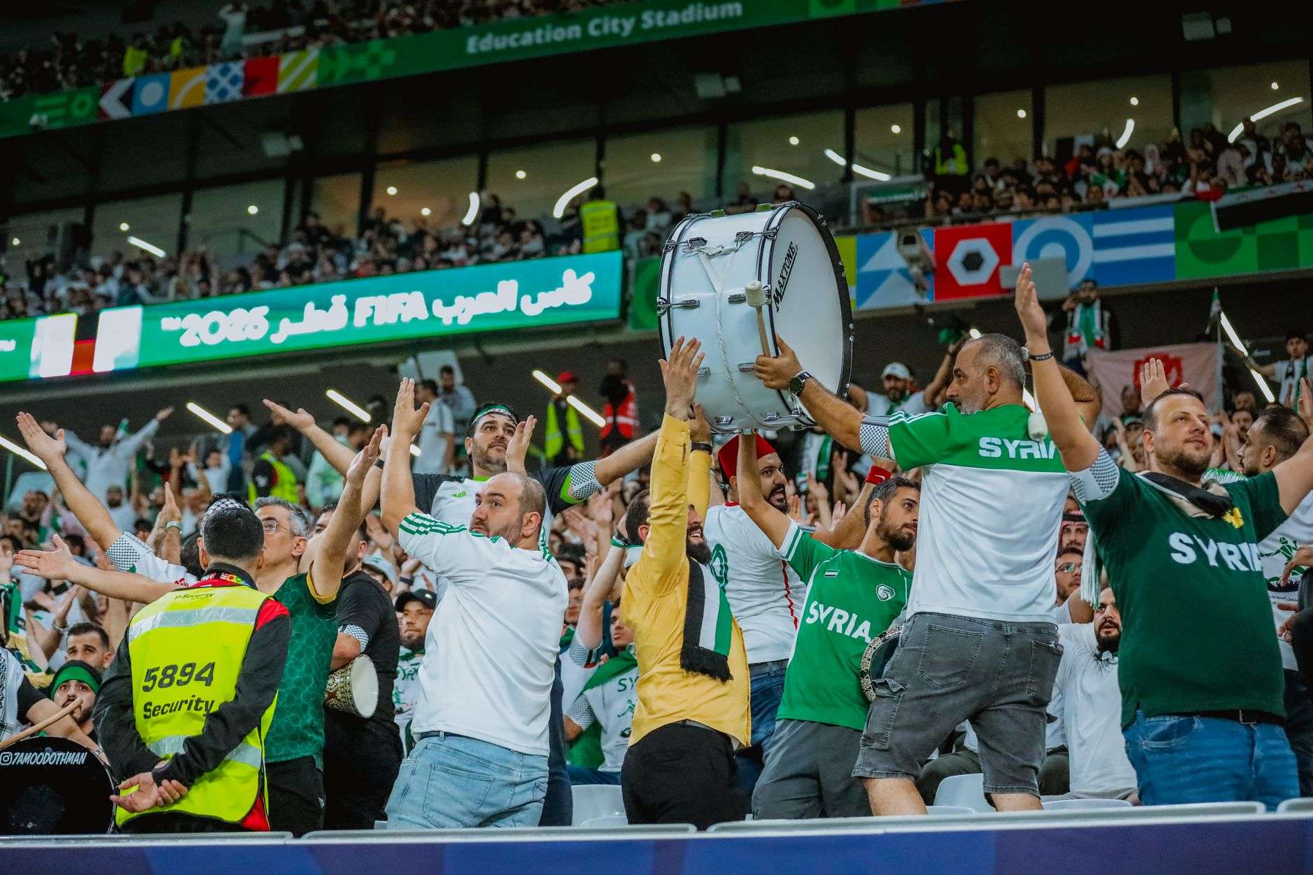 excited syrian fans at fifa event in qatar
