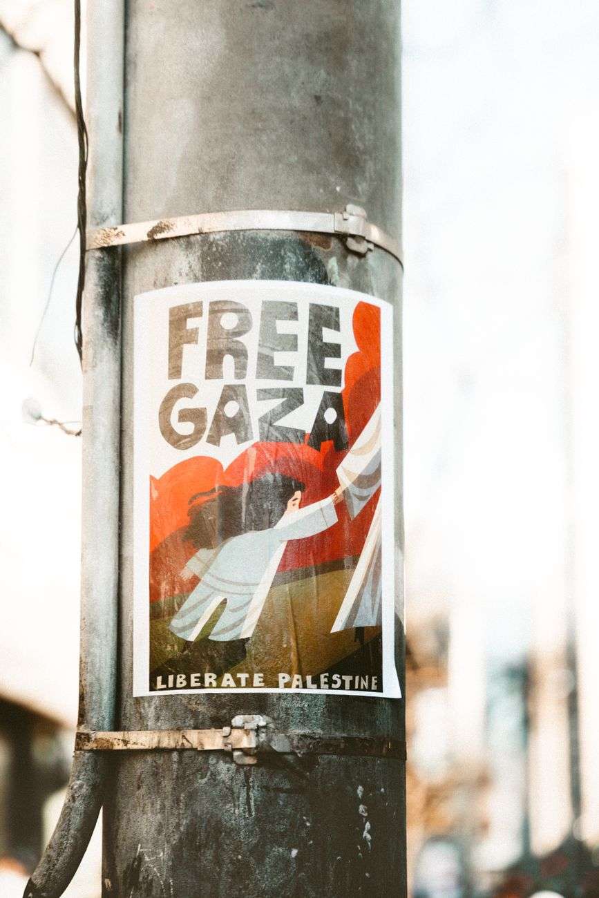 free gaza poster on street lamp