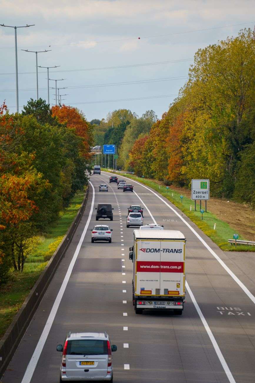 scenic highway in autumn with traffic