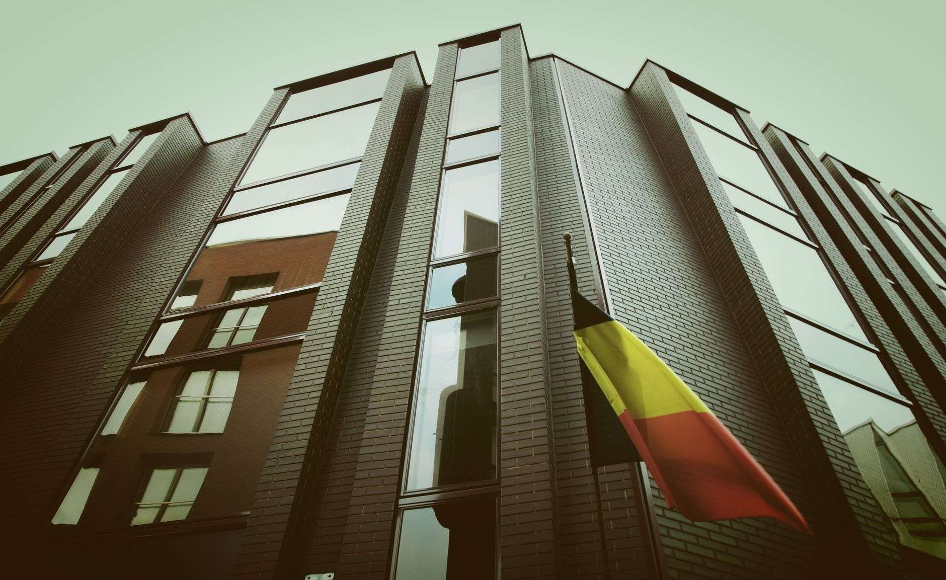 low angle photography of gray building