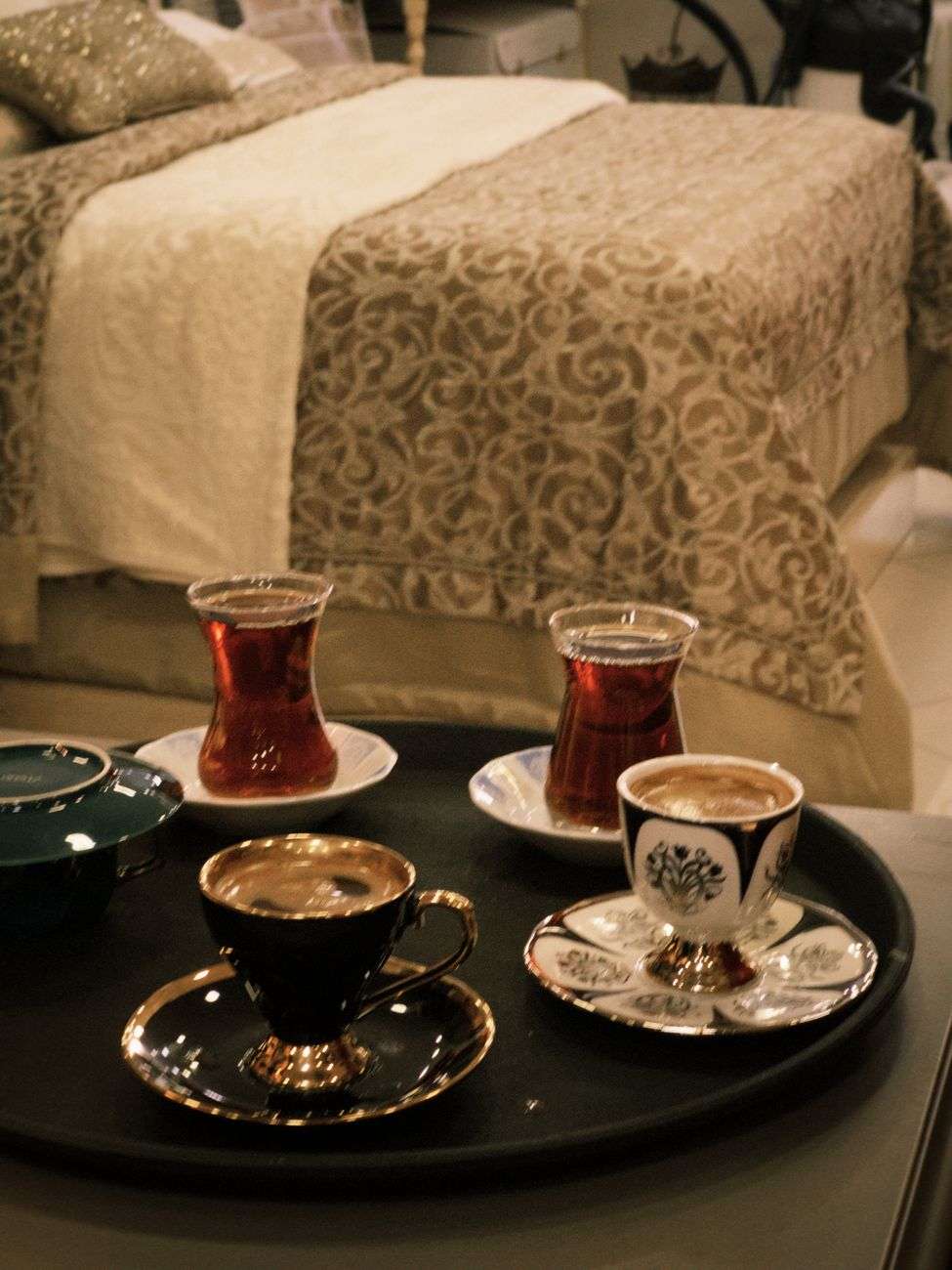 elegant tea and coffee setup in cozy bedroom