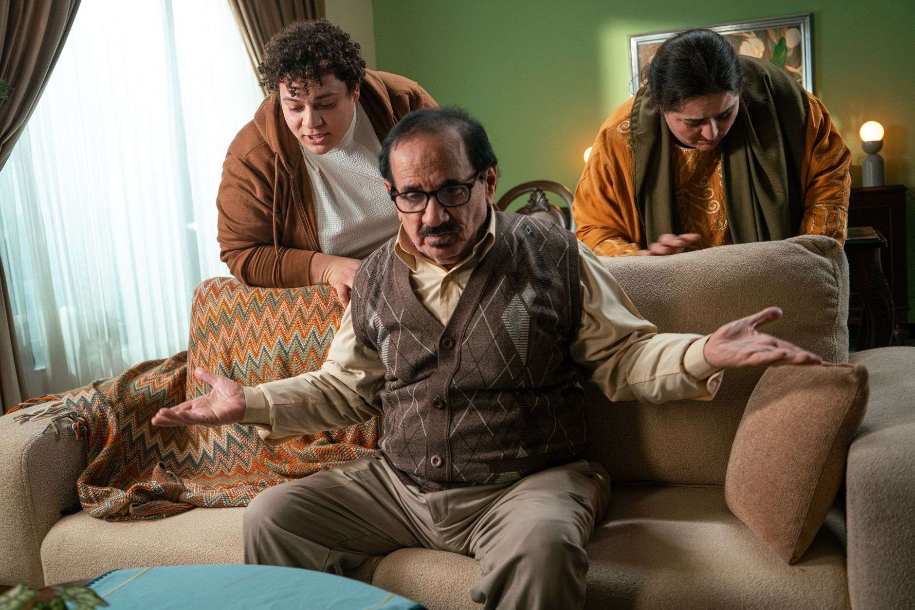 family discussion in living room setting